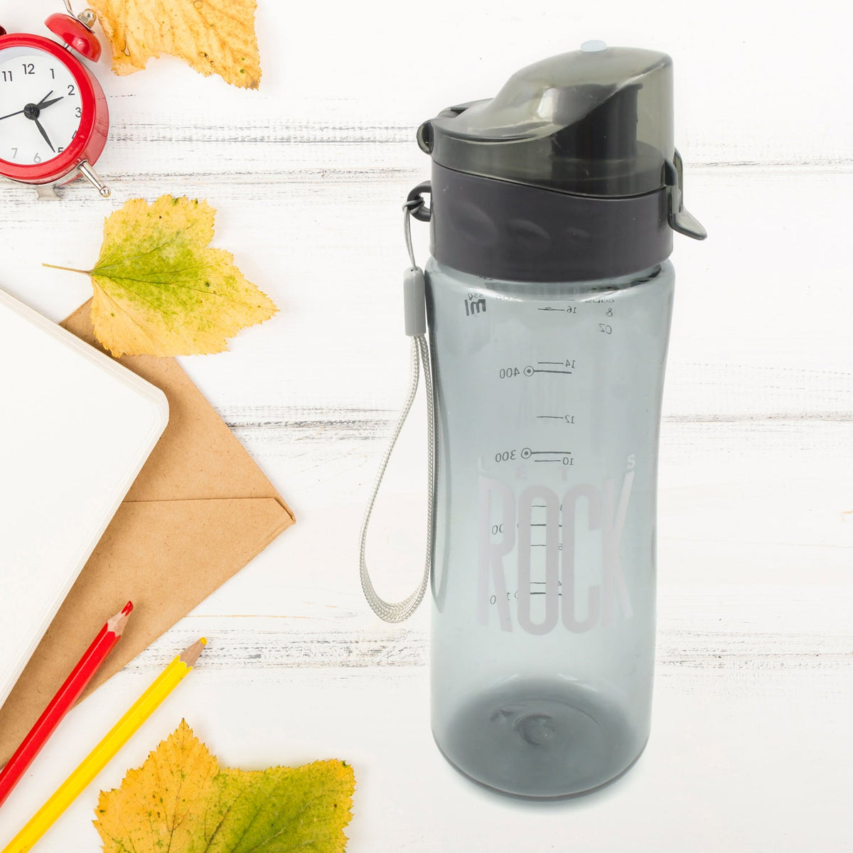 Close-up of the BPA-free plastic water bottle with its stylish bamboo lid.