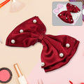Elegant heart-shaped hair bow clip, perfect for girls.