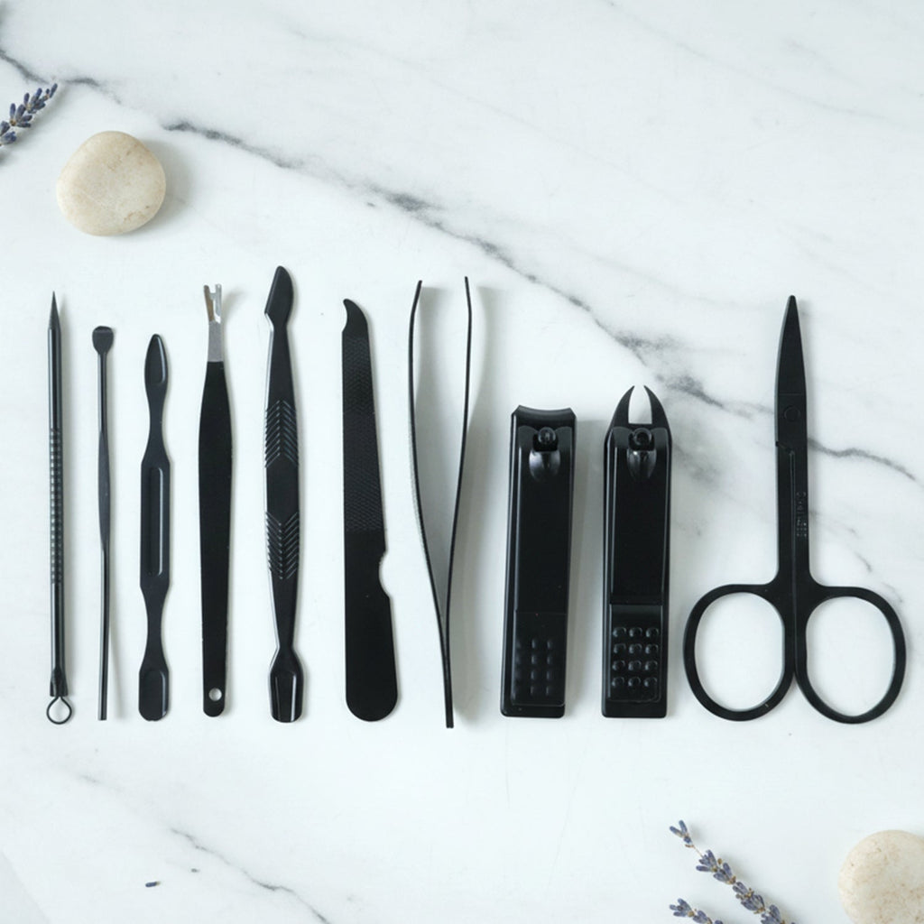 Manicure kit featuring precision cutters and nail grooming tools