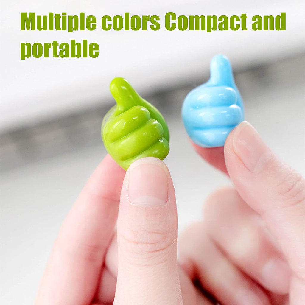 Versatile WipeTech cable clips used as wall hooks for small items.