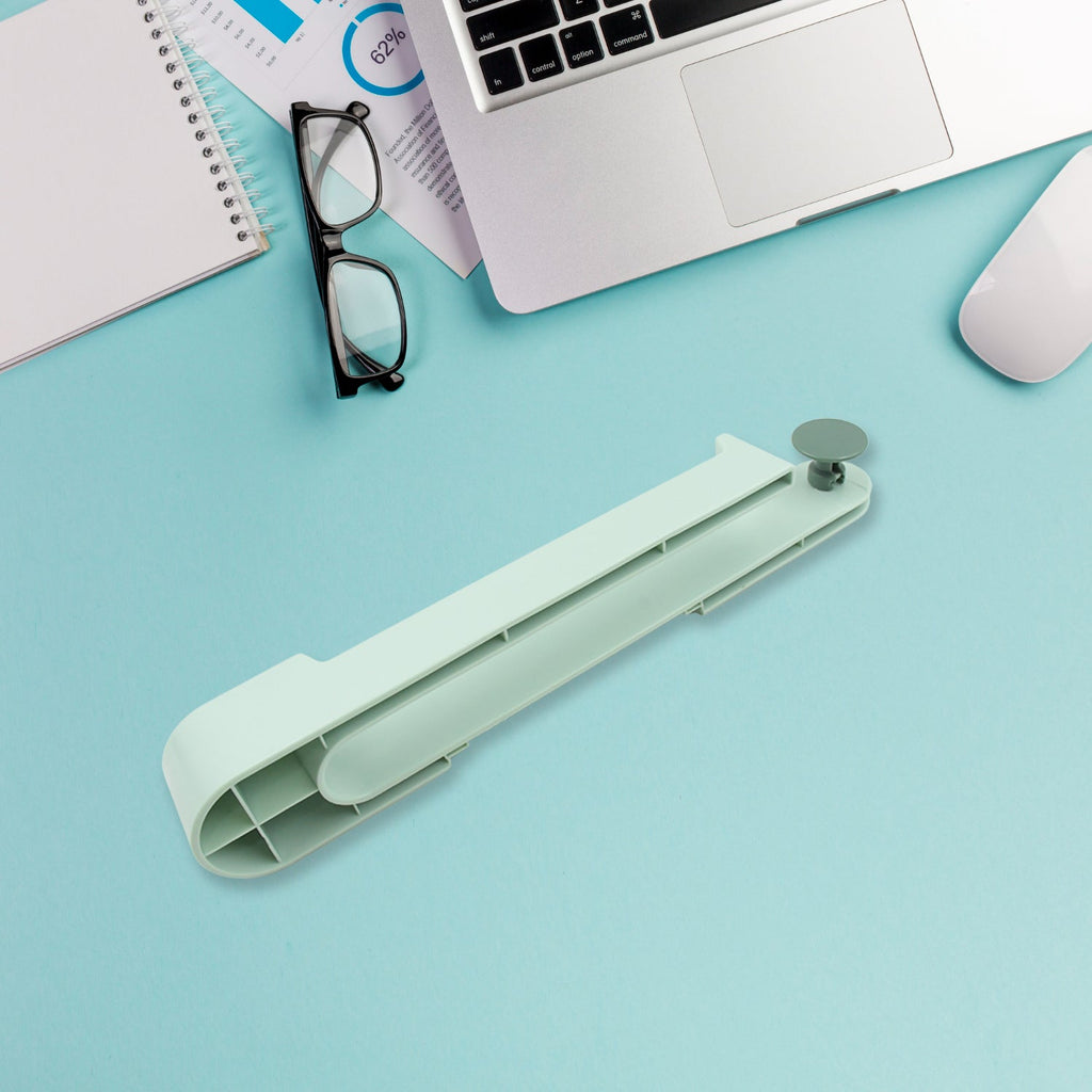 The durable plastic Wall Mounted Towel Holder displayed in a home setting.