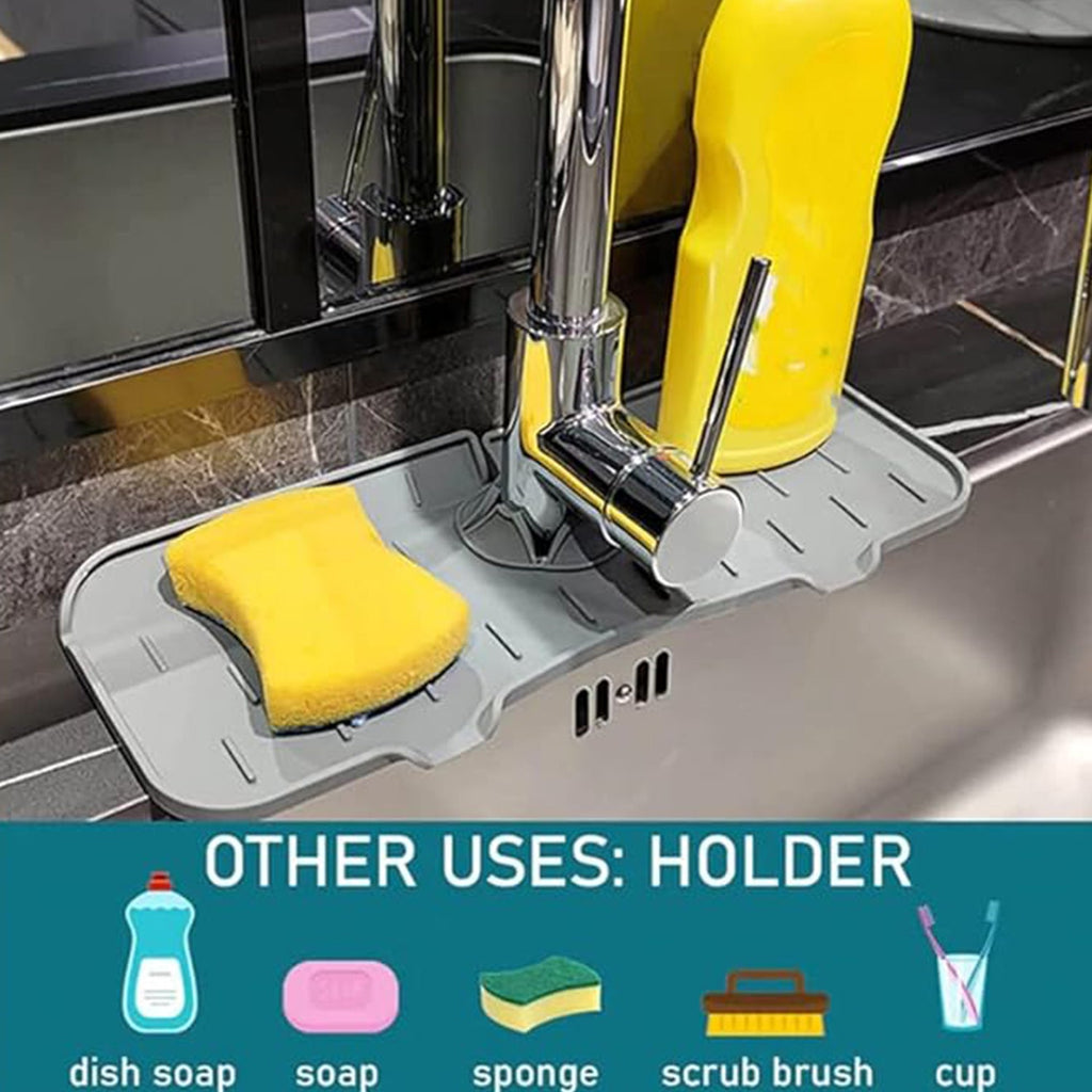 Overhead view of the silicone faucet mat holding a sponge and soap dispenser, functioning as a drying pad.