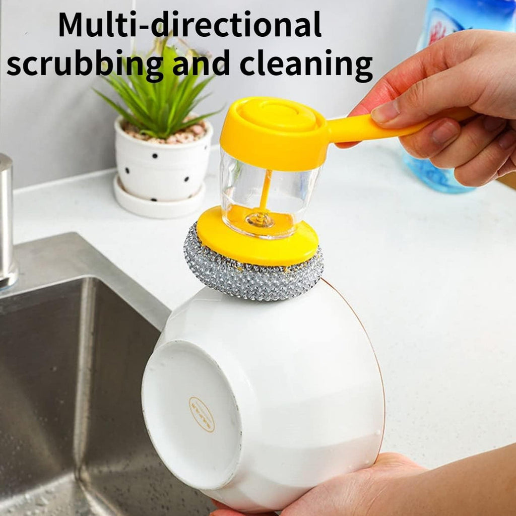 Action shot of the soap dispenser with scrub making quick work of dirty dishes.