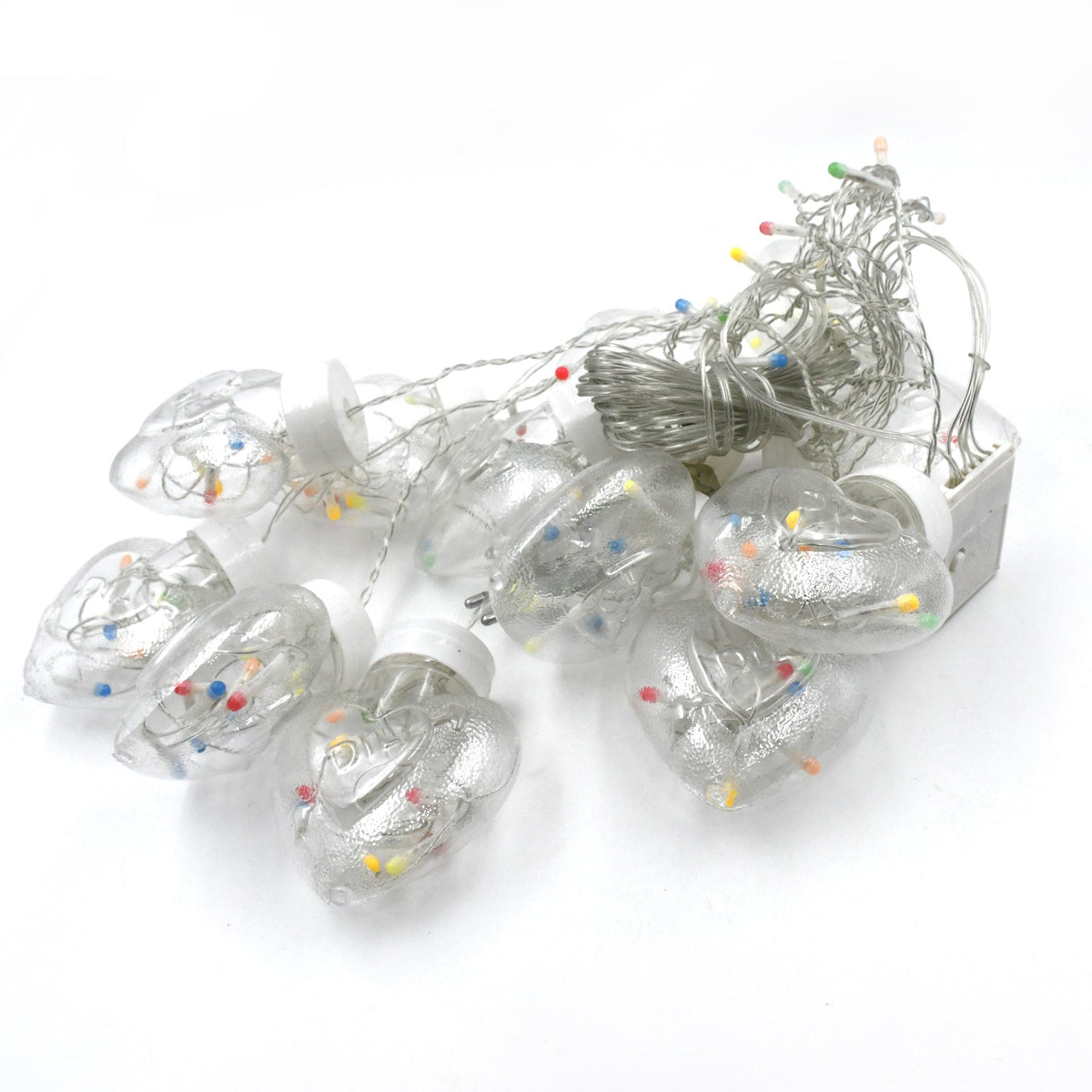 Bright LED wish ball lights creating a warm ambiance for an indoor celebration.