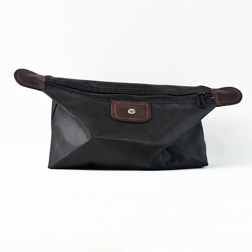 Travel shoulder bag in stylish black waterproof fabric for grooming kits