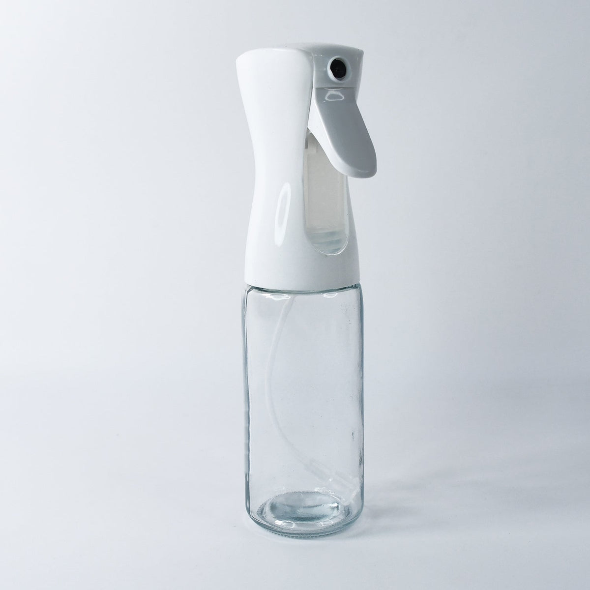 Versatile glass oil sprayer demonstrating its compact design.