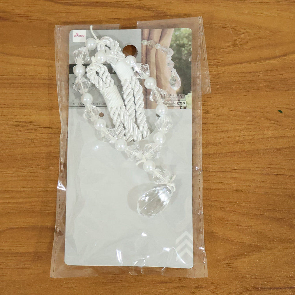 Fancy crystal curtain strap with teardrop pendant detail