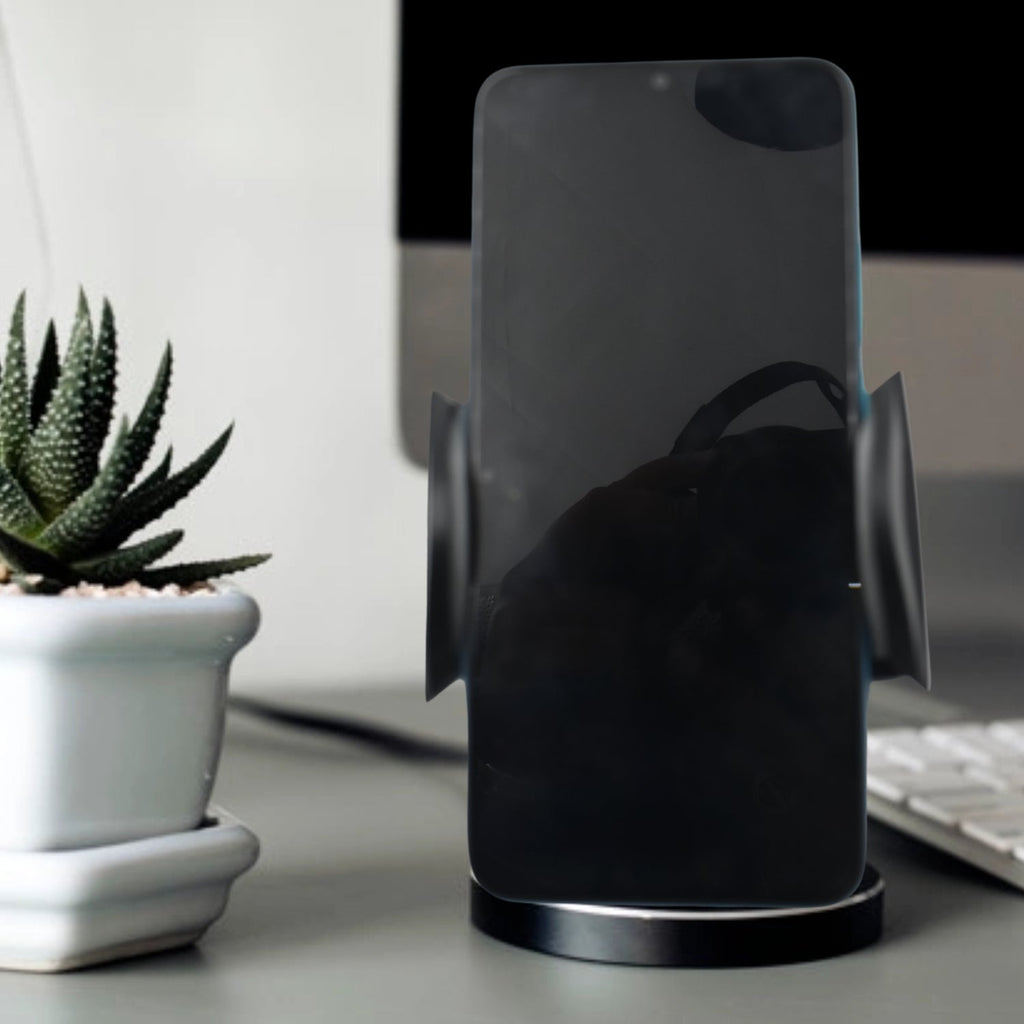 A smartphone securely mounted in the PHOBIA Car Vent Mobile Holder inside a car.