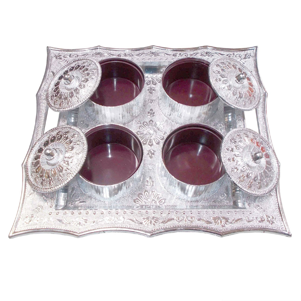 Traditional mukhvas dani with secure airtight lids on a dark background.