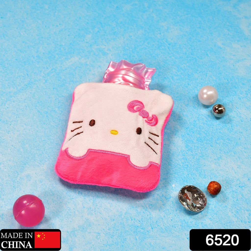 Close-up of the pink hot water bag's soft fabric cover.