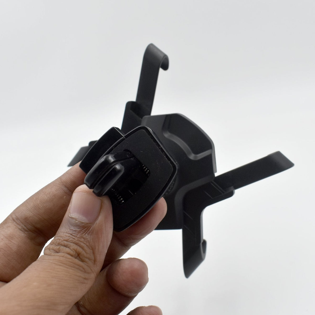 A secure air vent mobile holder for car interiors, showcasing its robust clamp.