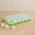 Assortment of flexible silicone ice cube trays in vibrant colors on a white background.