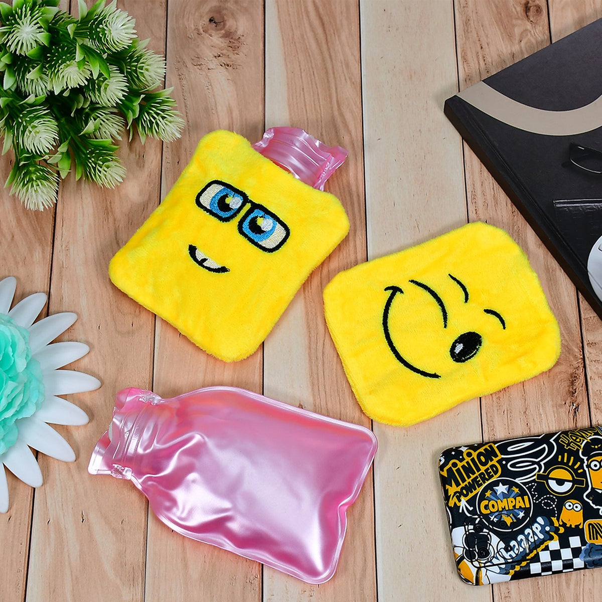 Adorable emoji hot water bag, perfect for soothing aches and pains.
