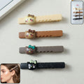 Set of cute cartoon cat hair clips with playful design