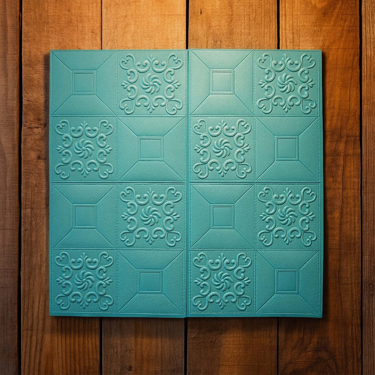 Stack of cyan colored 3D foam wallpaper tiles