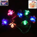 8 meter flower-shaped multicolor LED string lights glowing indoors