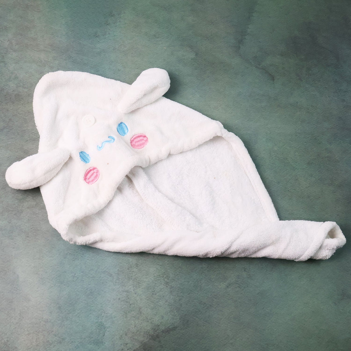 Close up view of premium microfiber cartoon design hair drying towel wrap